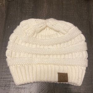 Cream CC beanie.